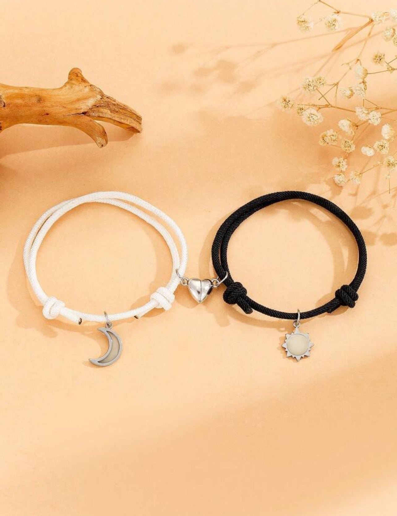 Couples bracelet with sun and moon magnetic heart detail