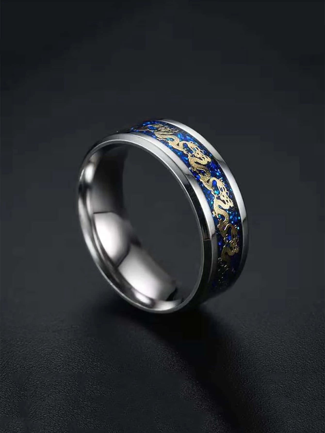 Silver and blue ring with dragon detail
