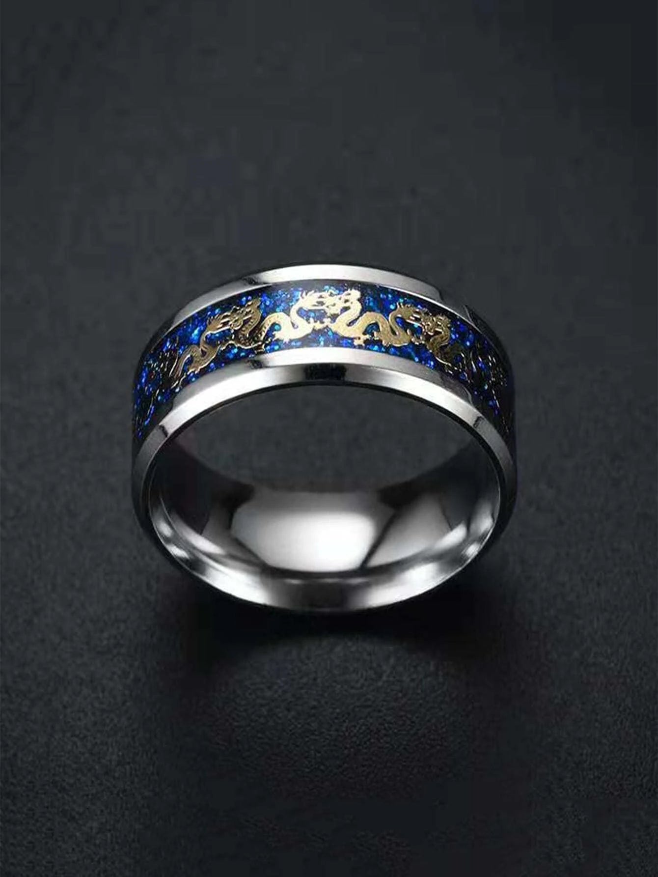 Silver and blue ring with dragon detail