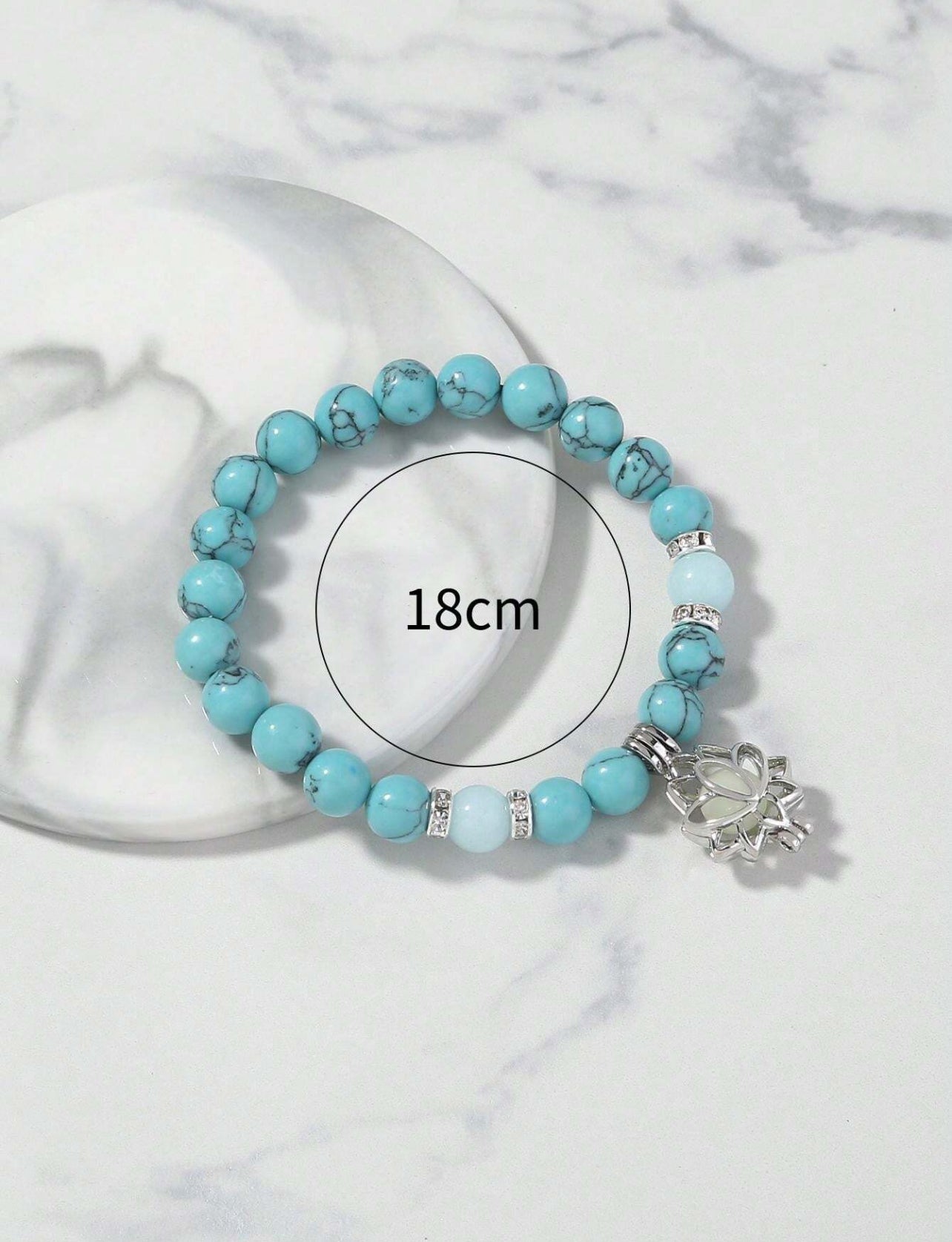 Dark shiny bead bracelet with flower accessory