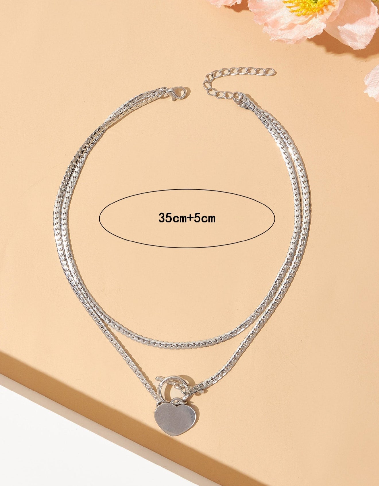 Mia Collar con Buckle y Corazón en Acero Inoxidable Plateado