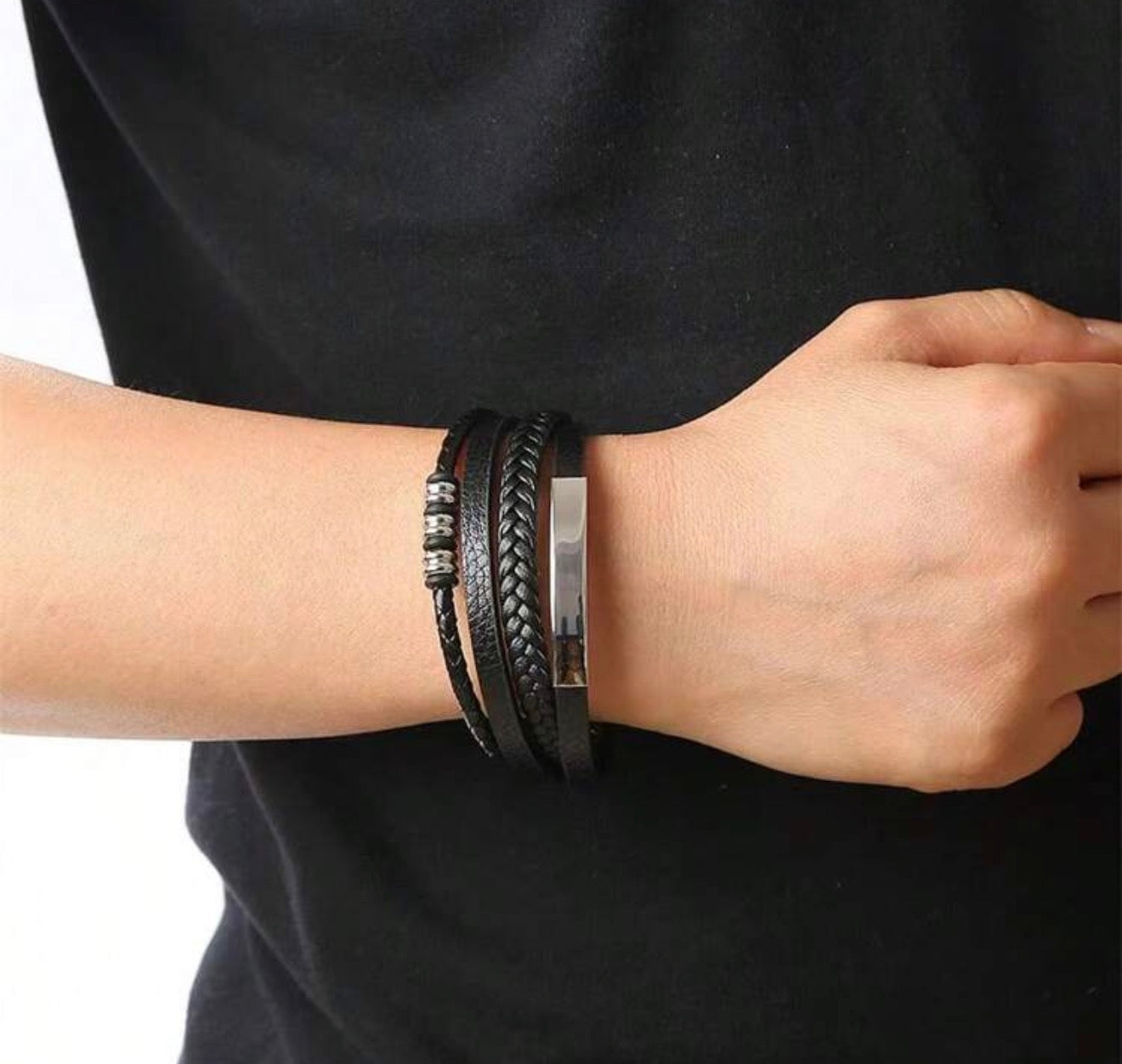 Layered bracelet with braided design and metal detail