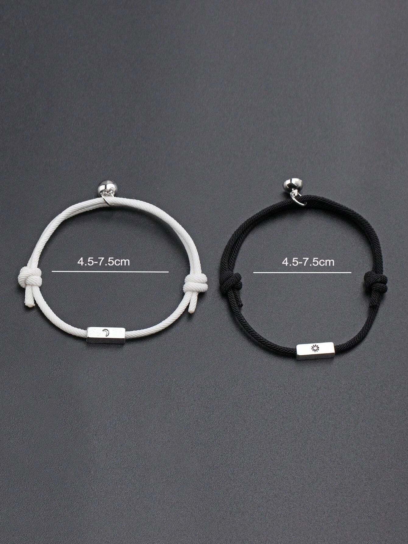 Couples bracelet with moon and sun detail in black and white 2 pieces