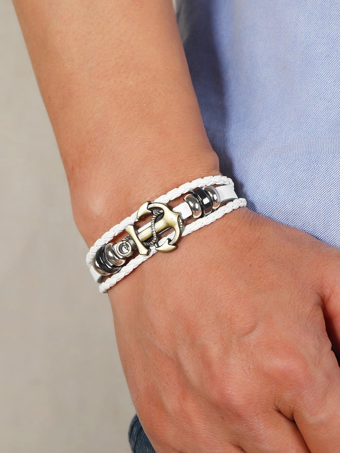 White leatherette layered bracelet with reinforced closure and anchor detail