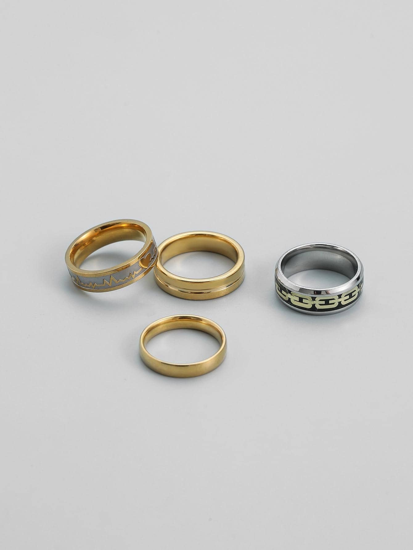 Set of golden stainless steel rings 4 pieces