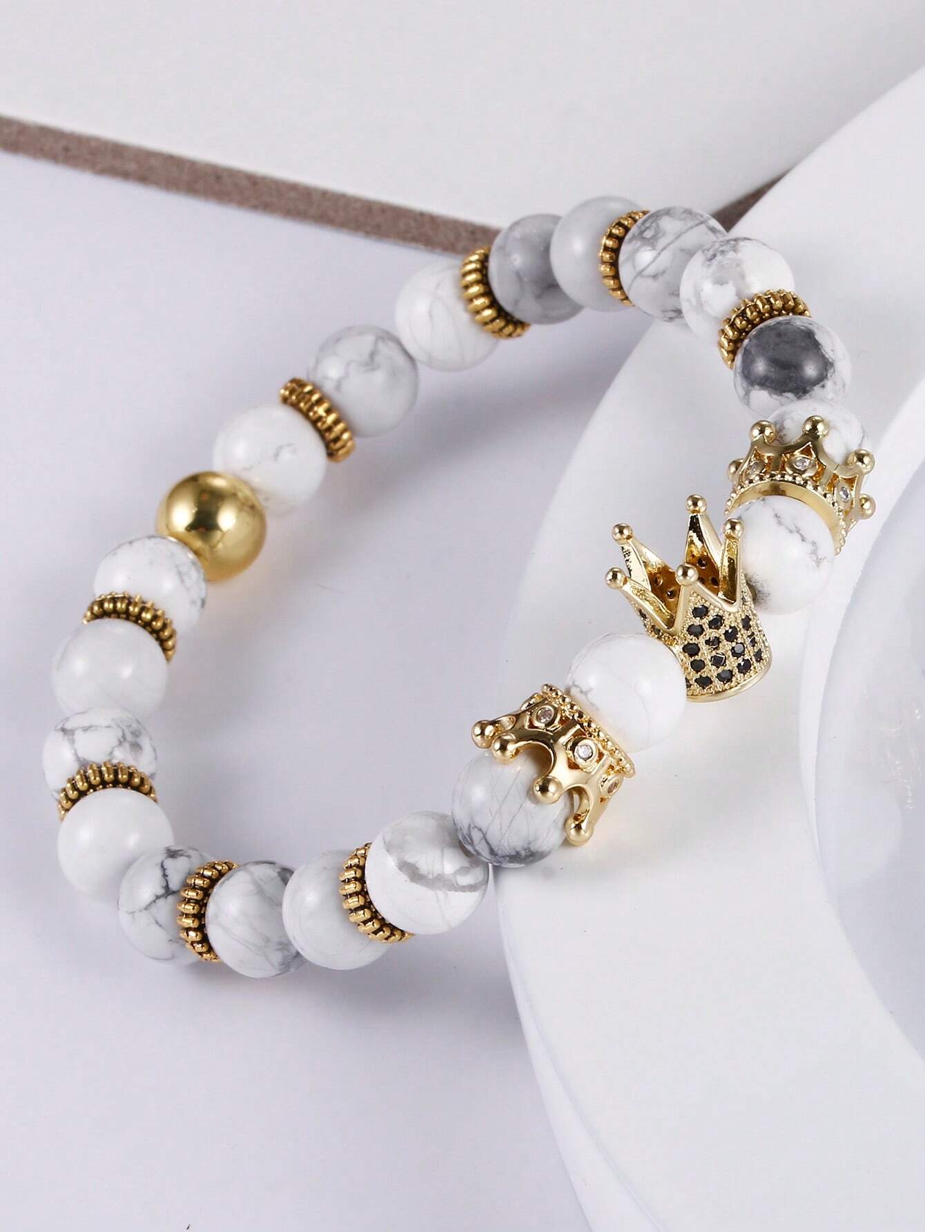 Howlite bead bracelet with adjustable gold crown accessory