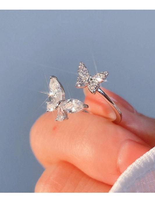 Sortija de dama minimalista ajustable con detalles de mariposa en acero inoxidable