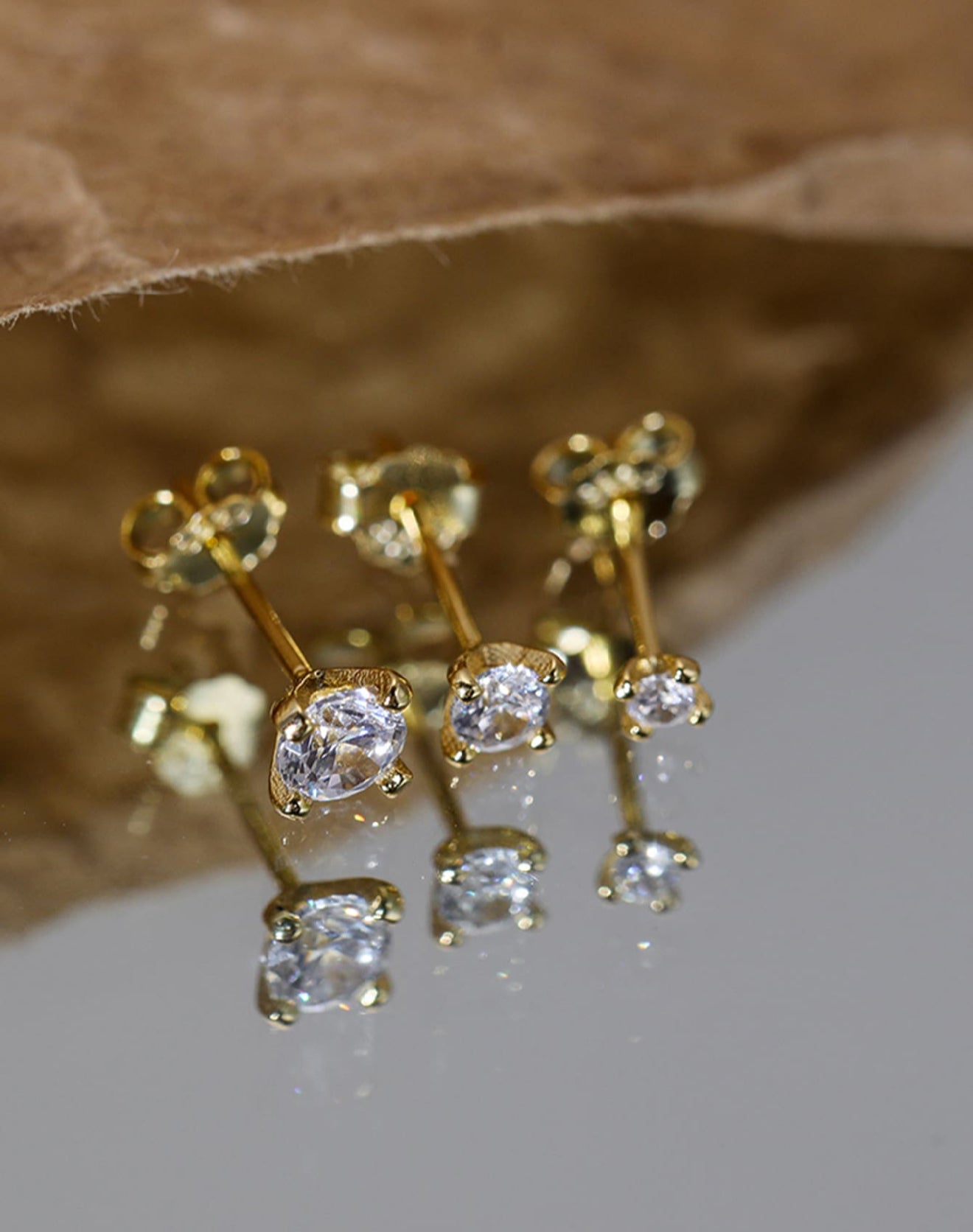 MIA - aretes de 3 piezas en Plata con baño de Oro de 14kl