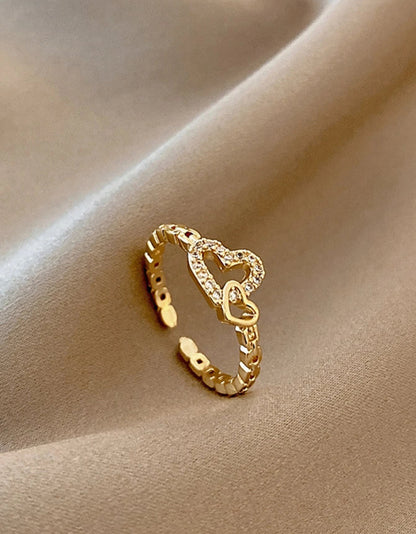 Sortija de dama doble corazón con circonio en acero inoxidable