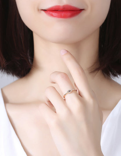 Sortija de dama en Plata con decoración de Ojo Turco y baño en oro rosa de 14kl