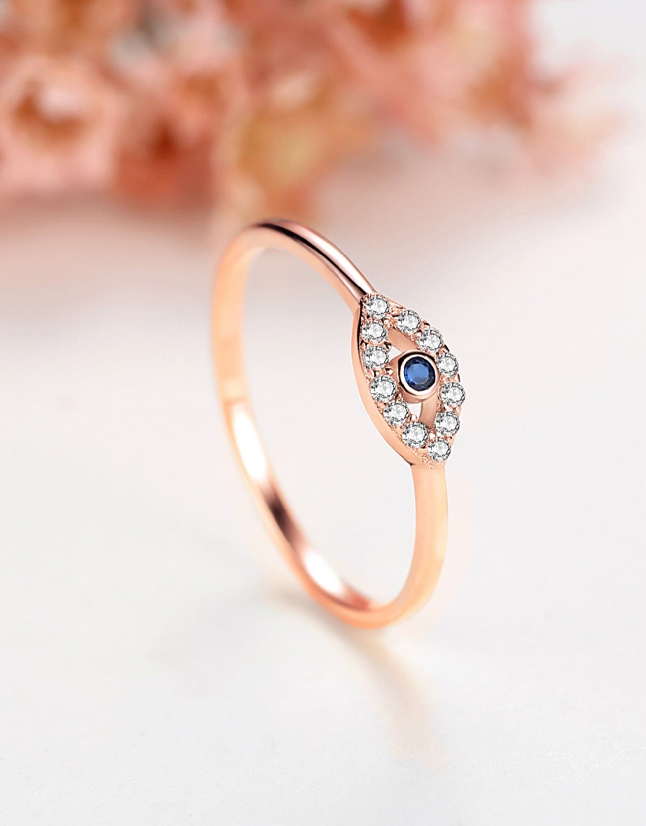 Sortija de dama en Plata con decoración de Ojo Turco y baño en oro rosa de 14kl