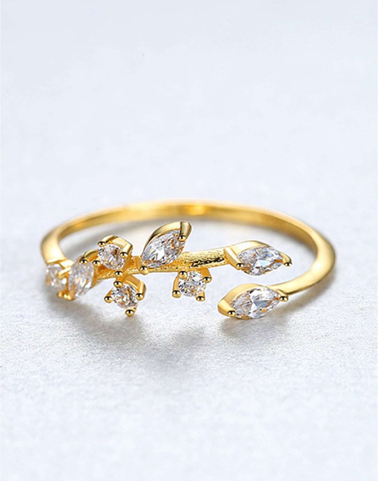 Sortija de dama en plata 925 Dorado con hojas y piedras