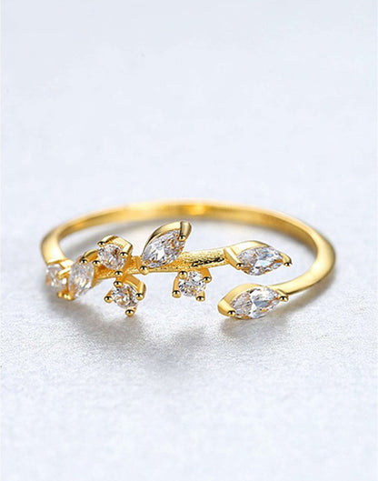 Sortija de dama en plata 925 Dorado con hojas y piedras