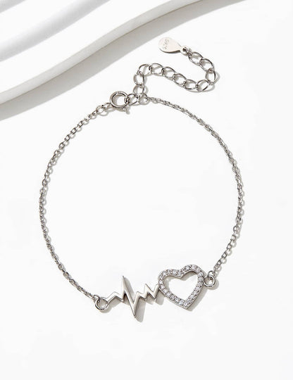 MIA - Pulsera de Plata con detalle de Corazón plateado