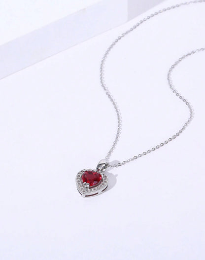 Mia Collar con dije de corazón y piedra roja en acero inoxidable plateado