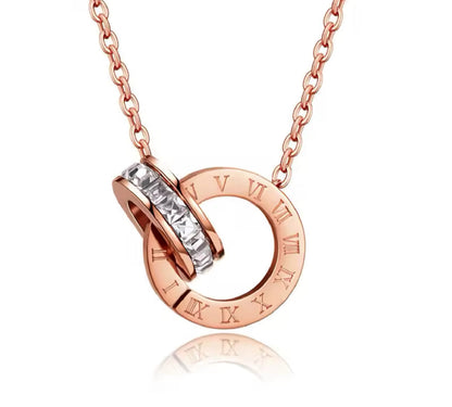 MIA - Set collar y aretes Romano con baño de oro rosa 18k