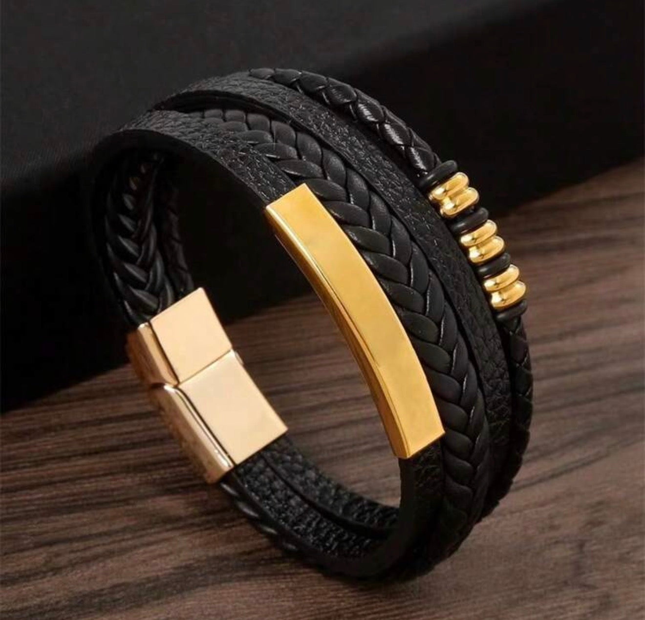 Double bracelet with magnetic closure and gold metal details
