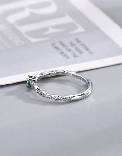 Sortija de dama plateado con circonio y piedra verde en acero inoxidable ajustable