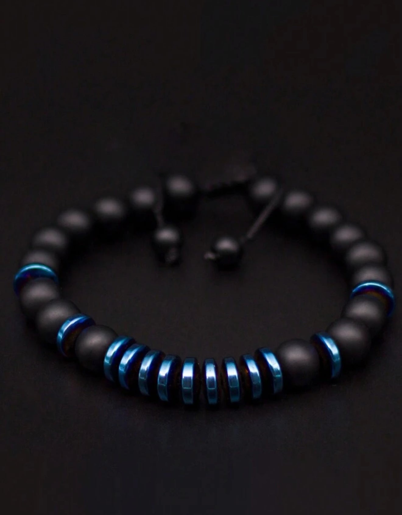 Pulsera Signature Single Ónix Mate y hematita azul ajustable