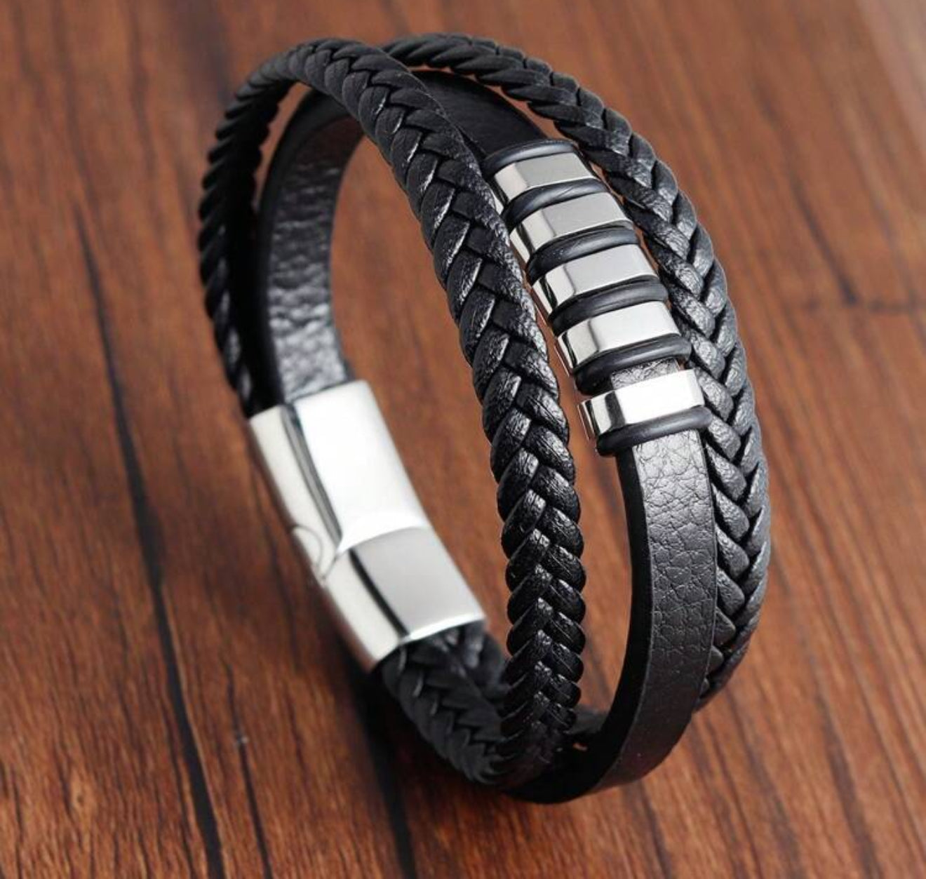 Pulsera Negra en Cuero Trenzado con plateado