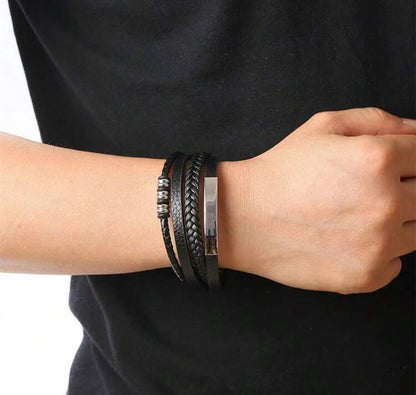 Layered bracelet with braided design and metal detail