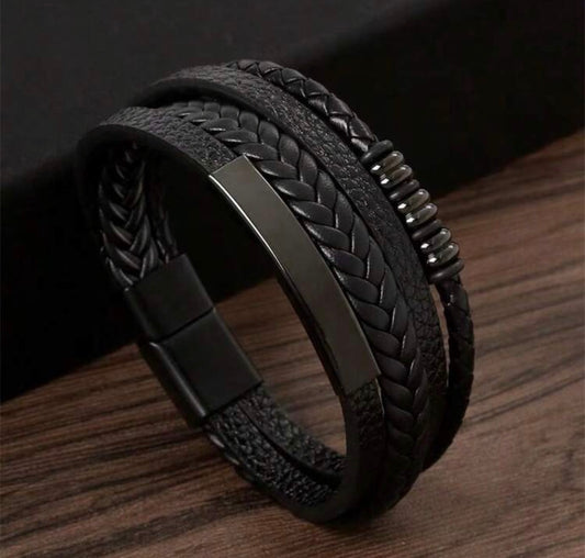 Layered bracelet with braided design and metal detail