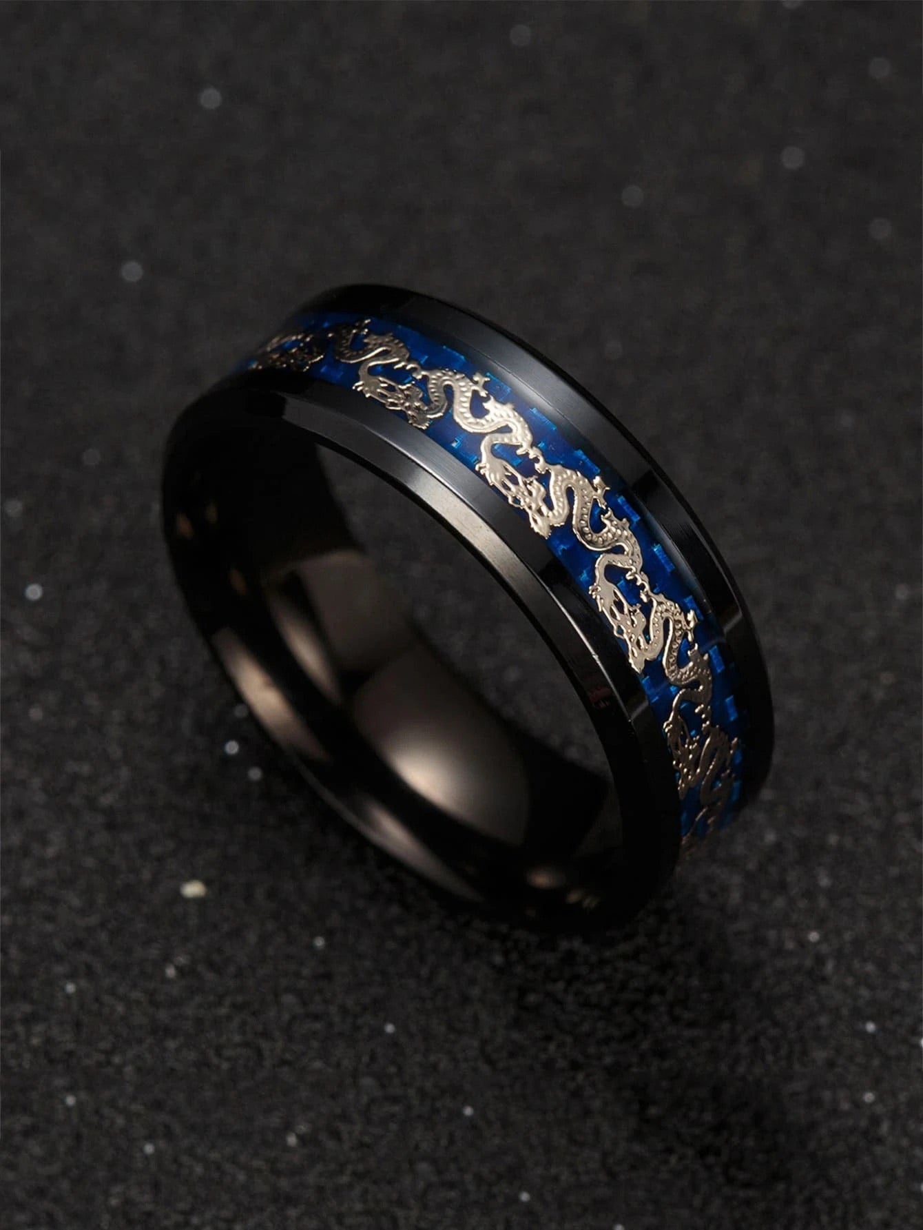 Black and blue ring with dragon detail