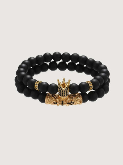 2-piece bracelet with black bead with golden crown