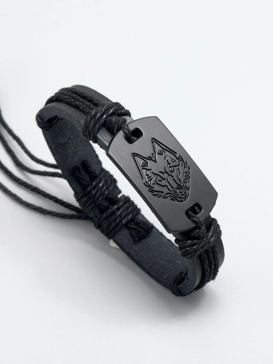 Pulsera negro con detalle cabeza de lobo