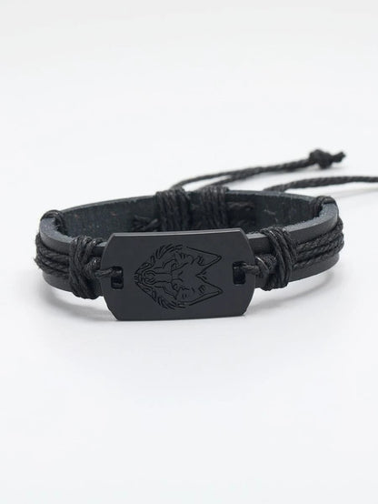 Pulsera negro con detalle cabeza de lobo