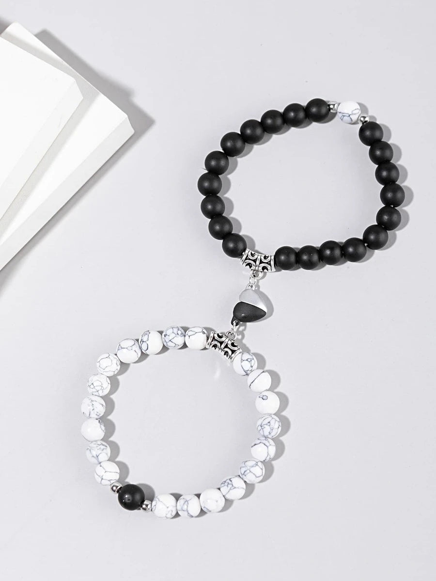 2-piece bracelet with magnetic couples bead with heart decoration