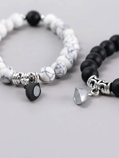 2-piece bracelet with magnetic couples bead with heart decoration