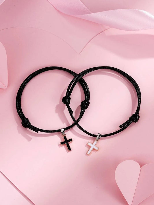 Couples bracelet with cross accessory