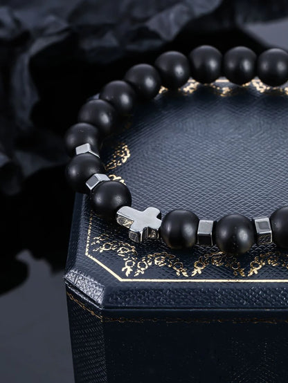 Bracelet with cross decoration bead